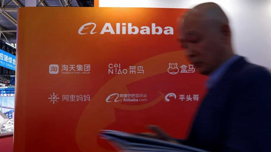 A man walks past the Alibaba booth during the first China International Supply Chain Expo (CISCE) in Beijing, China November 28, 2023. REUTERS/Florence Lo