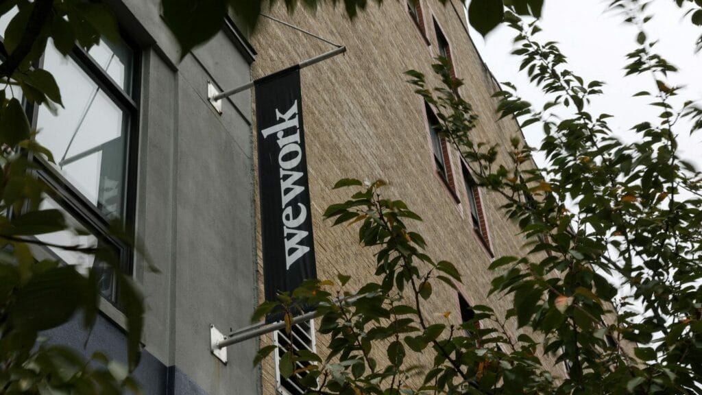 A WeWork logo is seen outside its offices in the Queens borough of New York City, U.S., November 7, 2023. REUTERS/Shannon Stapleton