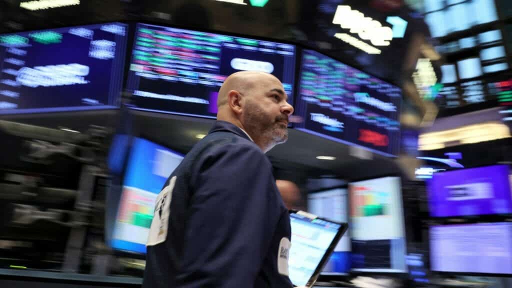 FILE PHOTO: A trader works on the floor at the New York Stock Exchange (NYSE) in New York City, U.S., October 27, 2023.  REUTERS/Brendan McDermid/File Photo