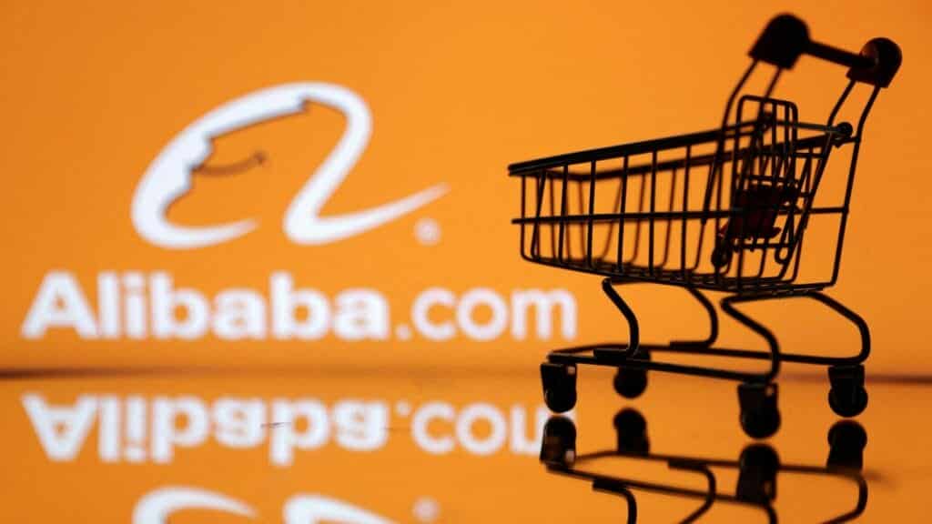 FILE PHOTO: Shopping trolley is seen in front of Alibaba logo in this illustration, July 24, 2022. REUTERS/Dado Ruvic/Illustration/File Photo