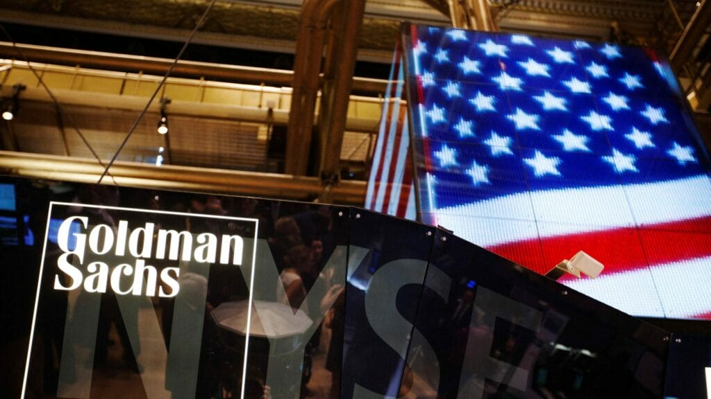 FILE PHOTO: The Goldman Sachs logo is displayed on a post above the floor of the New York Stock Exchange, September 11, 2013. REUTERS/Lucas Jackson/File Photo