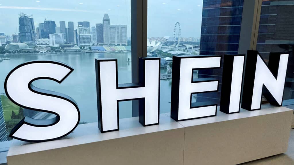 FILE PHOTO: A Shein logo is pictured at the company's office in the central business district of Singapore, October 18, 2022. REUTERS/Chen Lin/File Photo