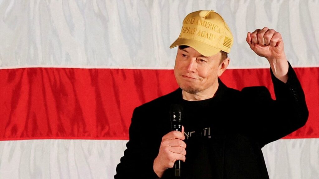 Tesla CEO and X owner Elon Musk, who supports Republican presidential nominee former U.S. President Donald Trump, gestures as he speaks about voting during an America PAC Town Hall in Folsom, Pennsylvania, U.S., October 17, 2024. REUTERS/Rachel Wisniewski     TPX IMAGES OF THE DAY