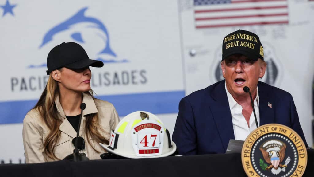 U.S. President Donald Trump and first lady Melania Trump attend a briefing on wildfire damage as they visit the Pacific Palisades neighborhood that was damaged by the Palisades Fire, in Los Angeles, California, U.S., January 24, 2025. REUTERS/Leah Millis