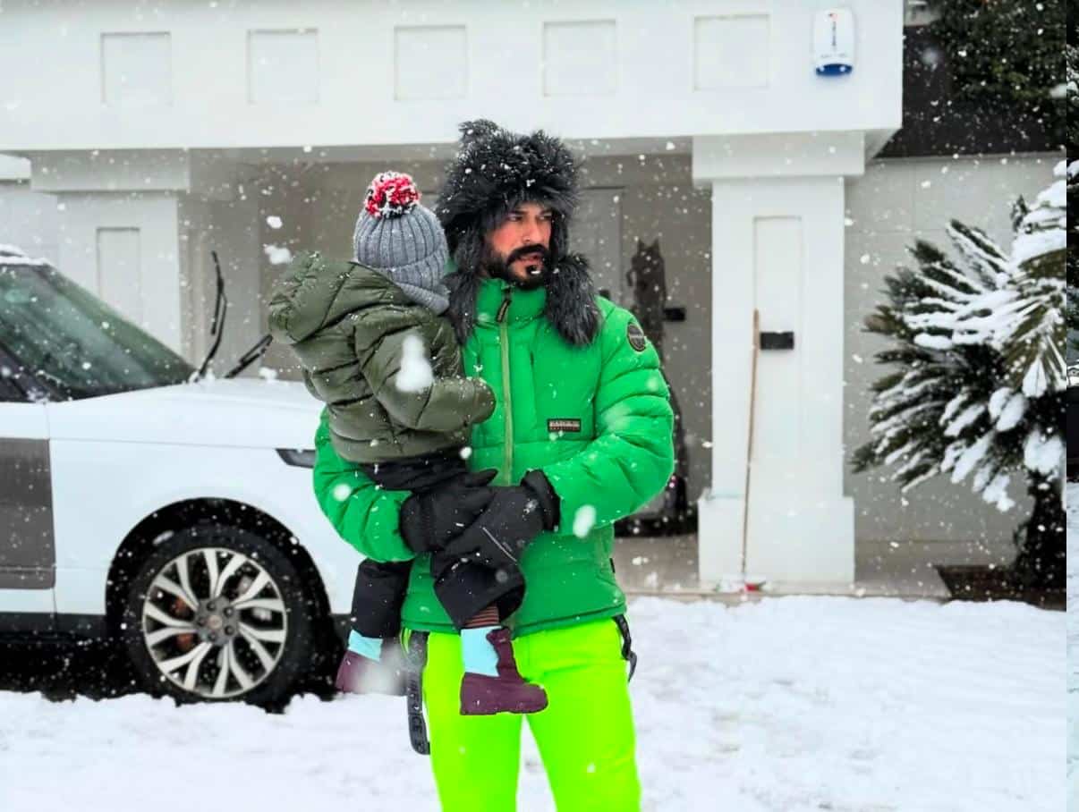 Бурак Озчивит с сыном