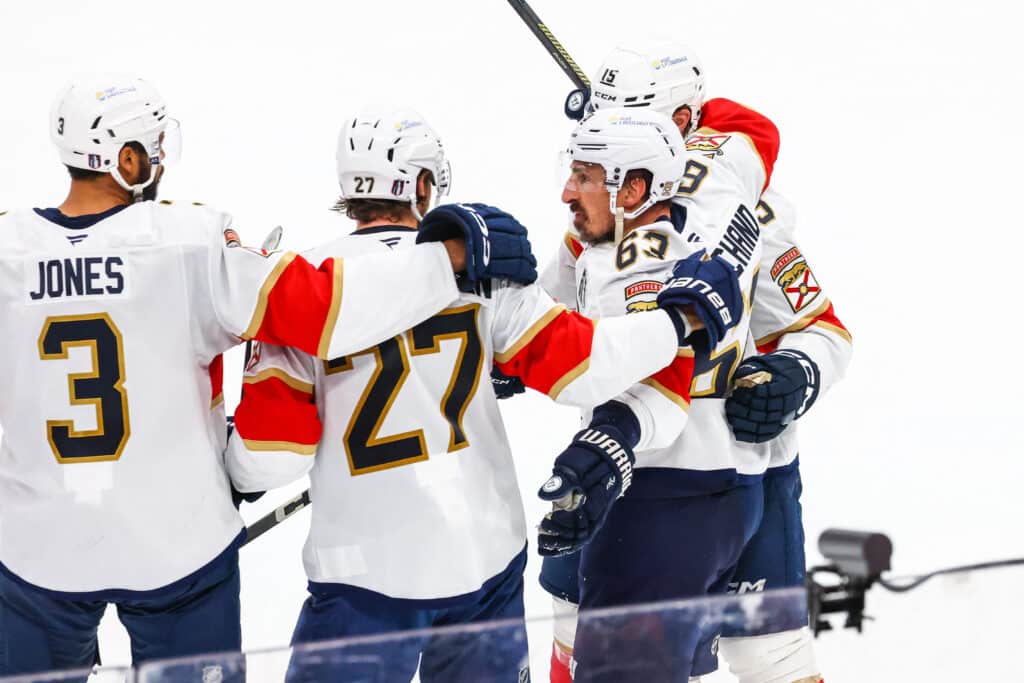 Jun 14, 2025; Edmonton, Alberta, CAN; Florida Panthers center Brad Marchand (63) celebrates his goal with teammates against the Edmonton Oilers during the third period in game five of the 2025 Stanley Cup Final at Rogers Place. Mandatory Credit: Sergei Belski-Imagn Images
