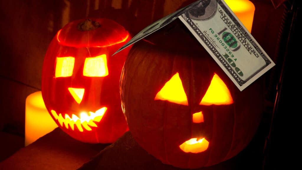 Two jack o'lanterns on the steps of a new york brownstone on halloween night, manhattan, new york city, united states of america, north america
