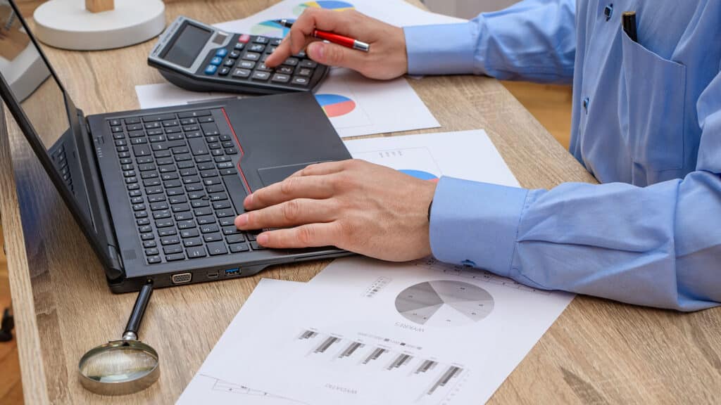 Man at work at desk, accountant
