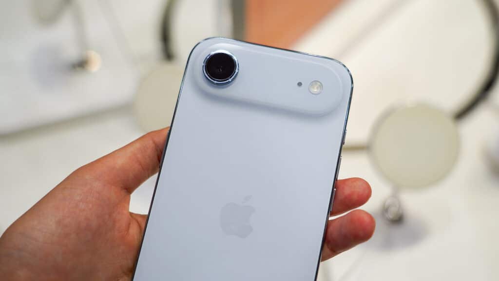 Taipei, Taiwan - September 20 2025: A customer gets a hands-on look at the new white Apple iPhone 17 Air at a retail store during its official product launch weekend.