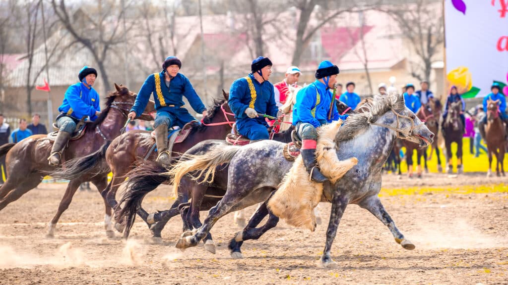 Shymkent, Kazakhstan, March 22, 2018: Equestrian traditional national competitions Kokpar, Kazakh Muslims and traditions, tests of young dzhigits in honor of the holiday of the spring equinox Nauryz.