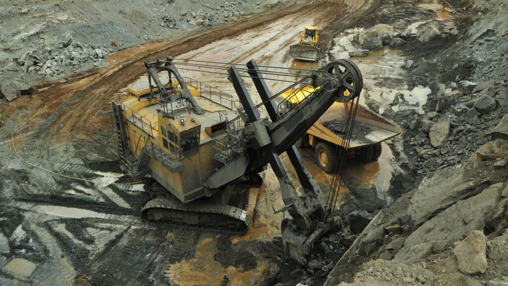 Industrial machines working in an iron ore mine