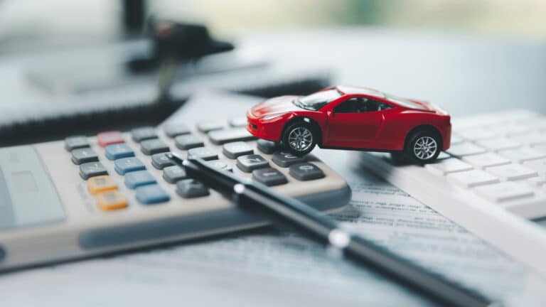 Сотни тысяч казахстанцев имеют долги по налогу на авто и жилье: ждать ли арест счетов