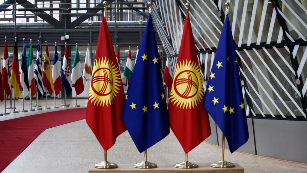 Brussels, Belgium. 12th April 2018.Flags of Europe and flags of Kyrgyz Republic in European Council builidng.