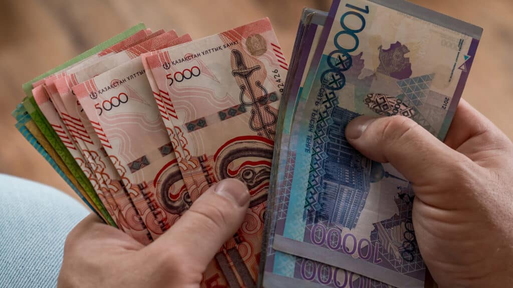 Hands Counting Cash Kazakhstani Tenge Banknotes