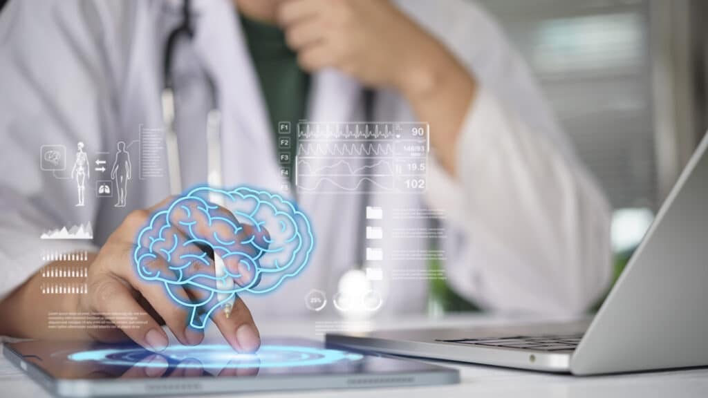 Doctor analyzing digital brain hologram on tablet with medical data interface. Concept AI neurology diagnosis, mental health technology, cognitive science research, and smart healthcare innovation.