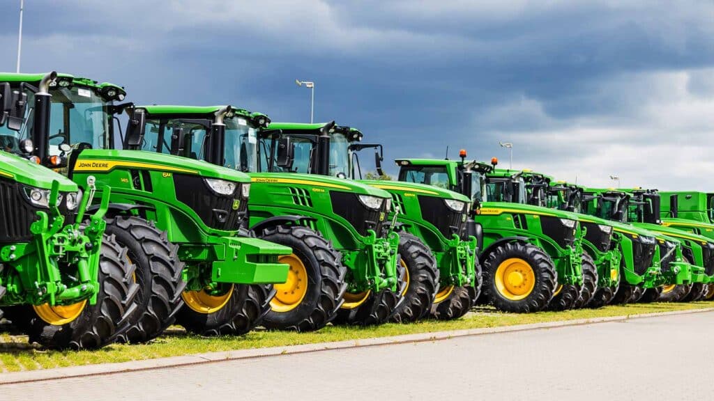 John Deere Agricultural Tractors in a Row on Dealership Lot. Kaunas, Lithuania, 19 June 2025
